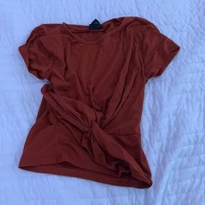 orange tied up shirt